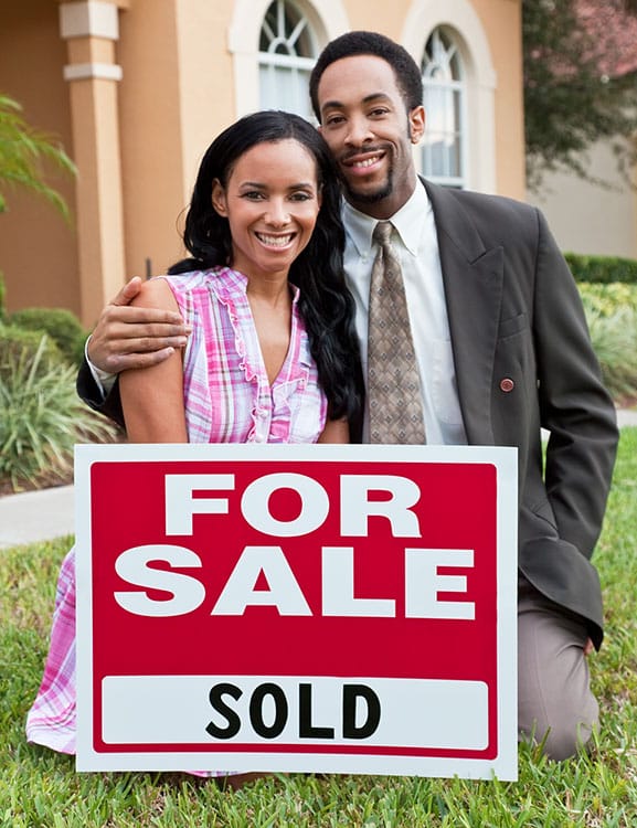 Couple celebrating after selling their home in Orlando