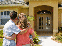 Couple outside a home for sale in Orlando