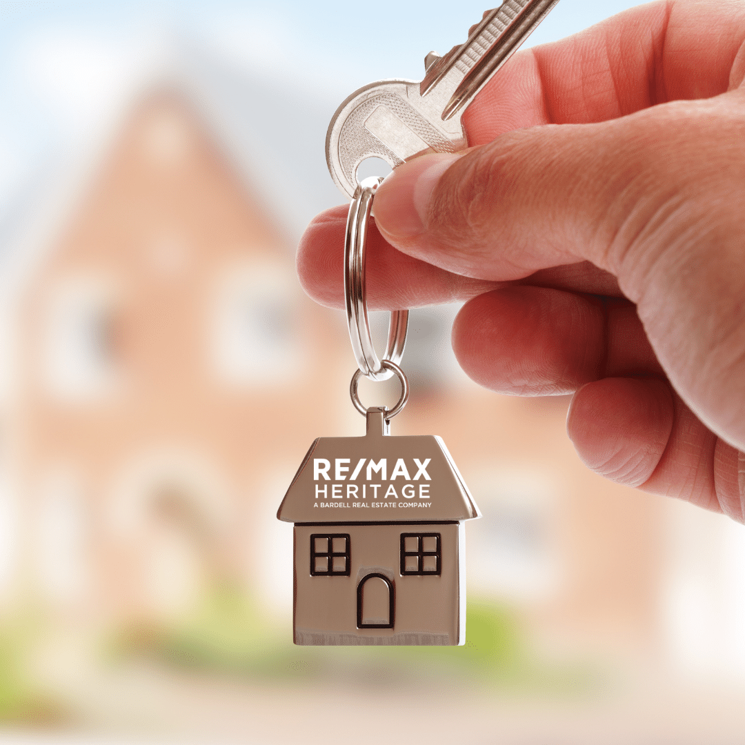 searching for a realtor Key chain with Remax name on it.